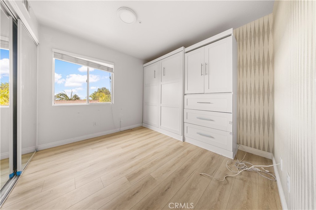 2 Cameron Circle Lake Forest, CA 92610 - Photo 22 of 45 an empty room with windows and closet