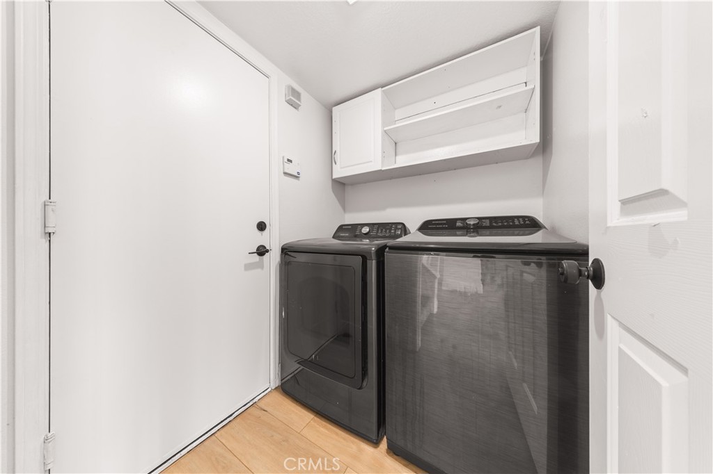 2 Cameron Circle Lake Forest, CA 92610 - Photo 25 of 45 a utility room with dryer and washer
