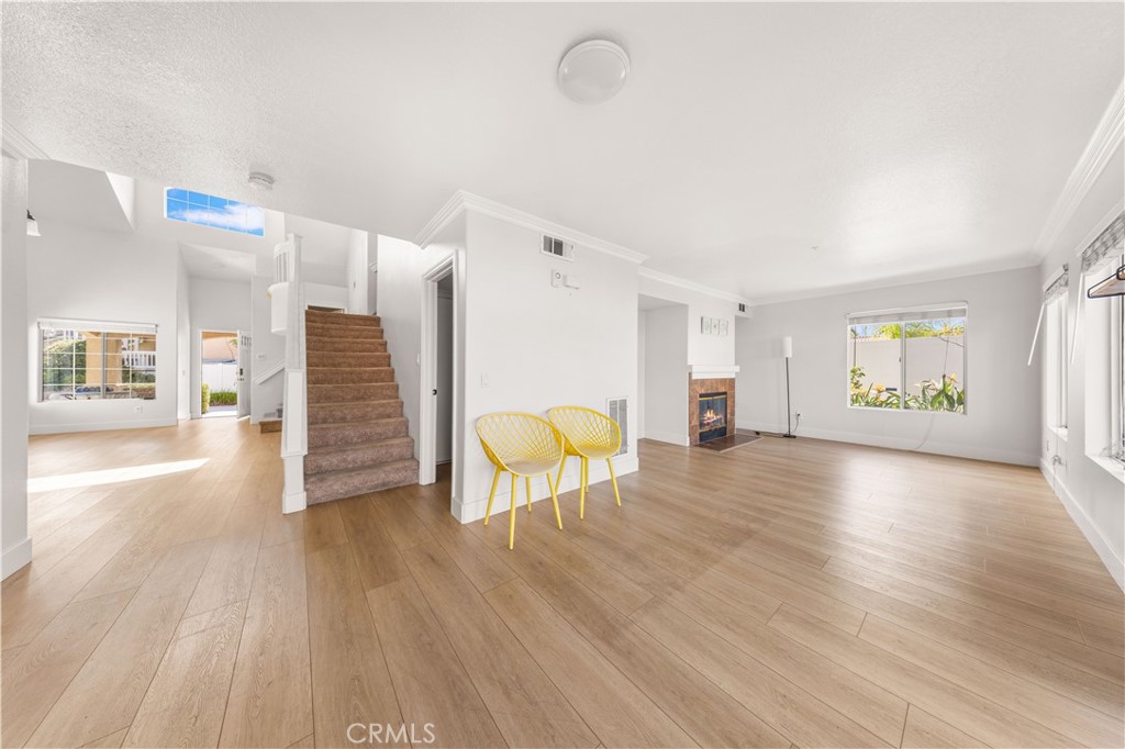 2 Cameron Circle Lake Forest, CA 92610 - Photo 10 of 45 a view of livingroom with furniture and wooden floor