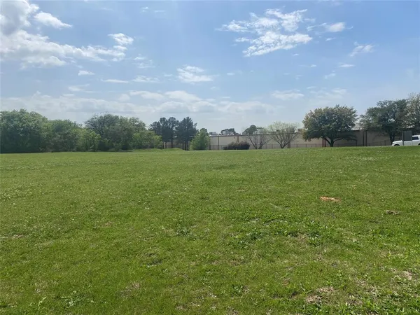 a fire hydrant in the middle of a field