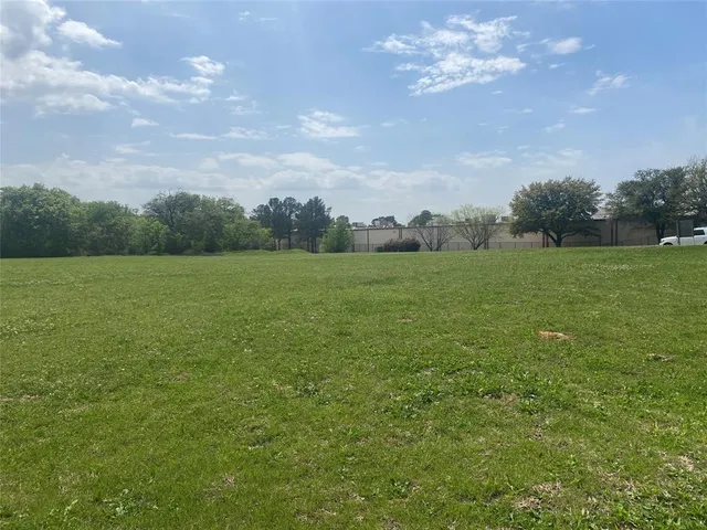 a fire hydrant in the middle of a field