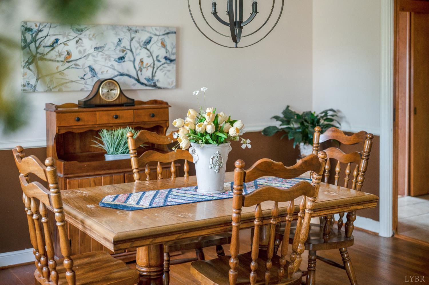41 Piedmont Road Rustburg, VA 24588 - Photo 13 of 51 a dining room with furniture and wooden floor