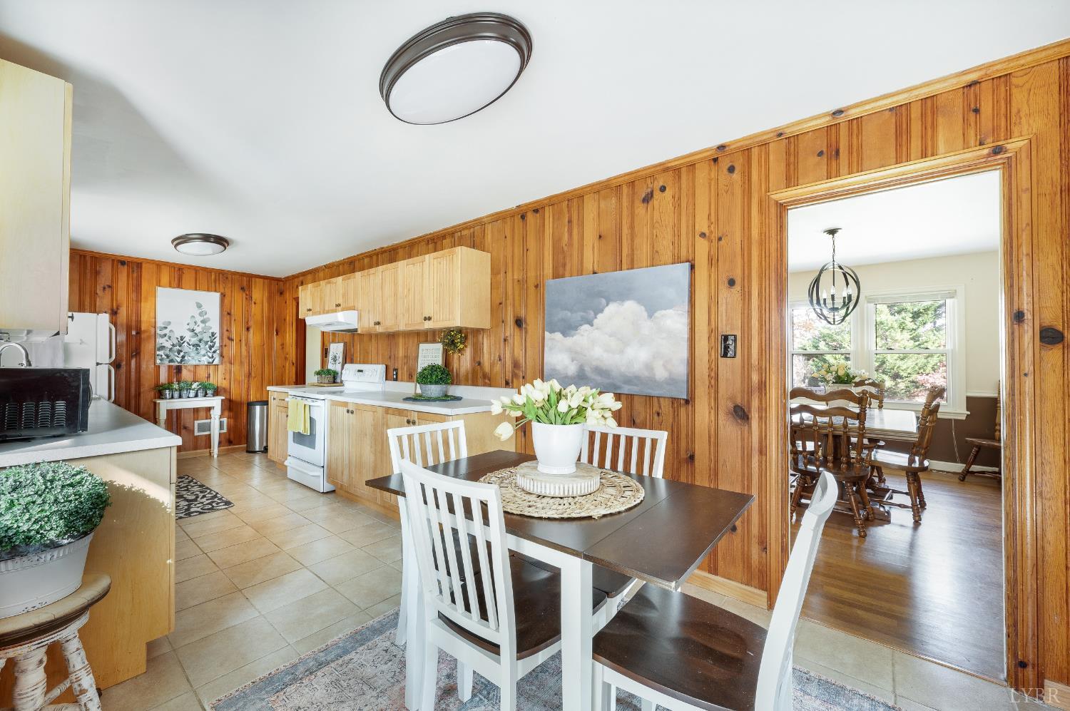 41 Piedmont Road Rustburg, VA 24588 - Photo 16 of 51 a view of a dining room with furniture window and wooden floor
