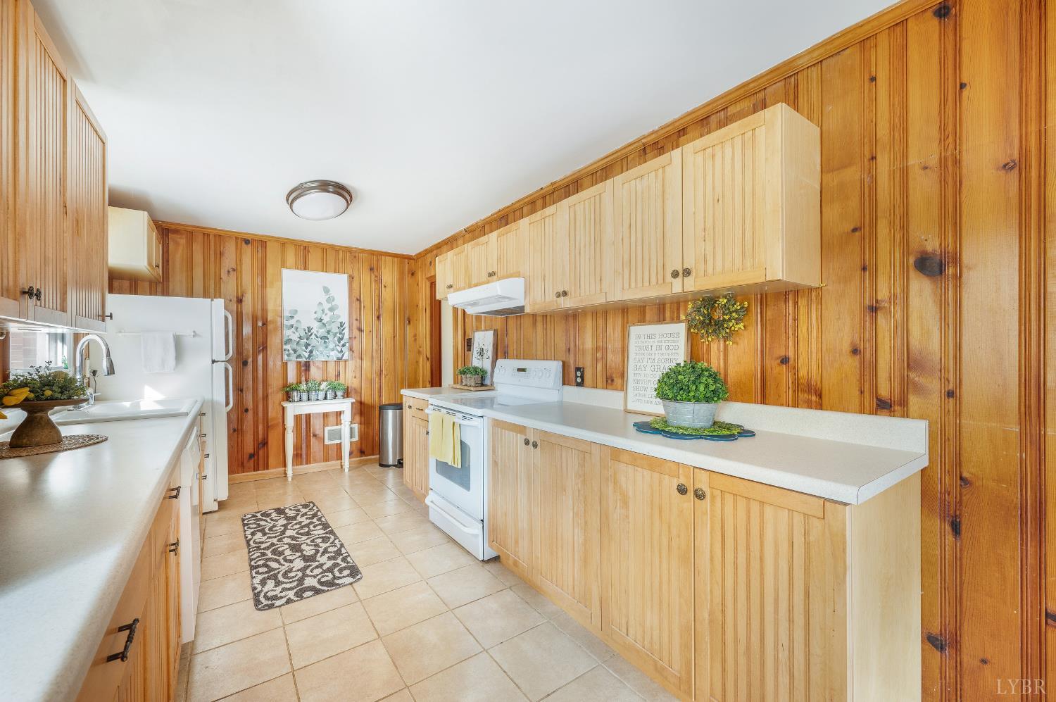 41 Piedmont Road Rustburg, VA 24588 - Photo 17 of 51 a kitchen with stainless steel appliances granite countertop a sink and cabinets
