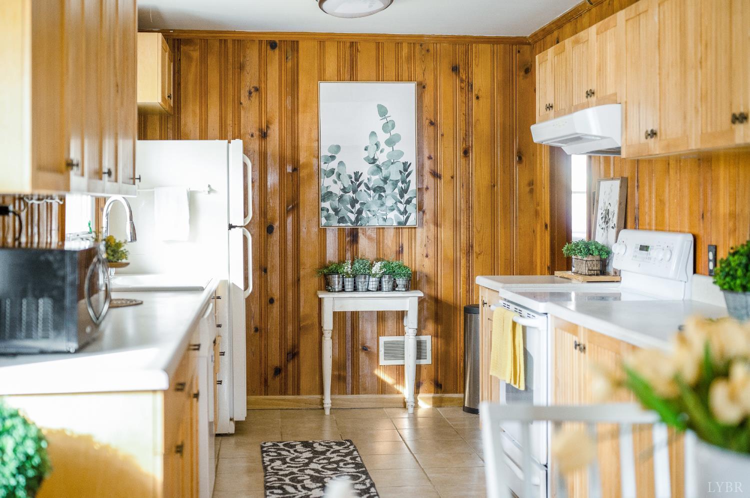 41 Piedmont Road Rustburg, VA 24588 - Photo 18 of 51 a kitchen with stainless steel appliances kitchen island granite countertop a refrigerator and a stove