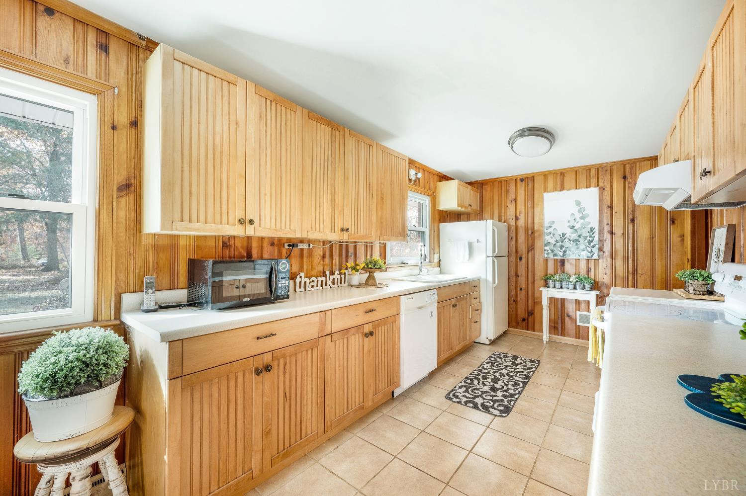 41 Piedmont Road Rustburg, VA 24588 - Photo 20 of 51 a kitchen with stainless steel appliances kitchen island granite countertop a stove a sink and a refrigerator