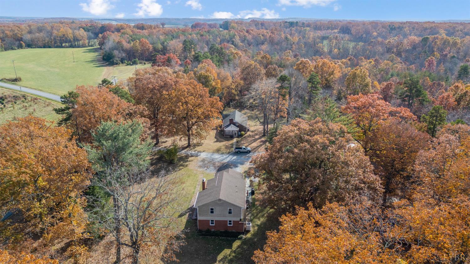 41 Piedmont Road Rustburg, VA 24588 - Photo 2 of 51 an aerial view of a houses with outdoor space and trees