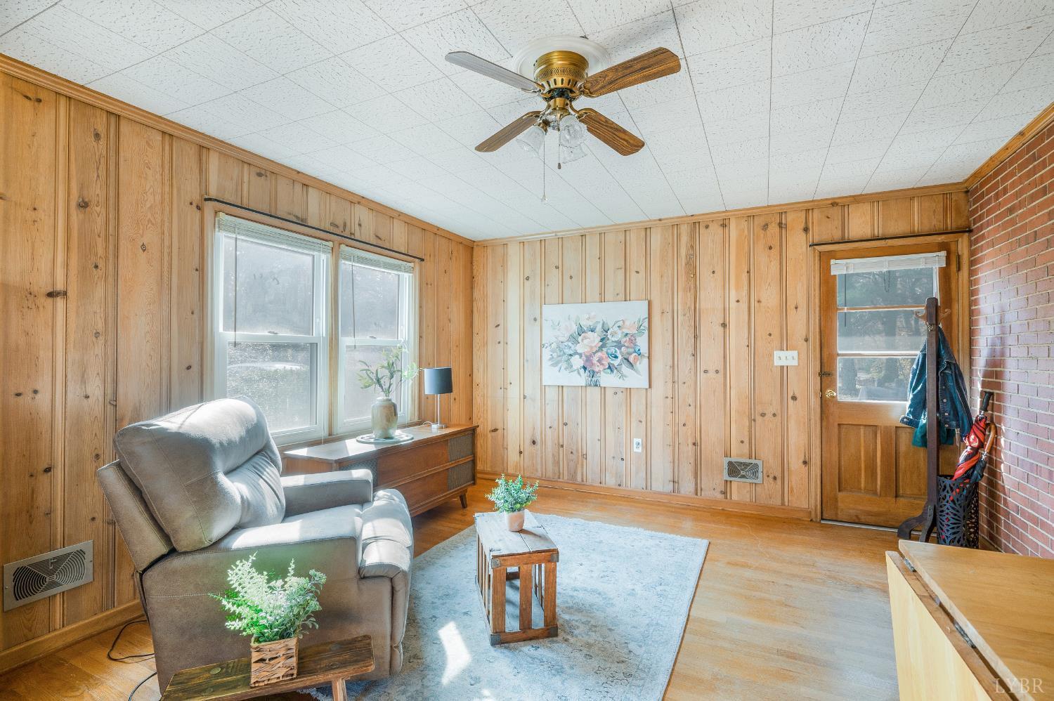 41 Piedmont Road Rustburg, VA 24588 - Photo 23 of 51 a living room with furniture and a large window