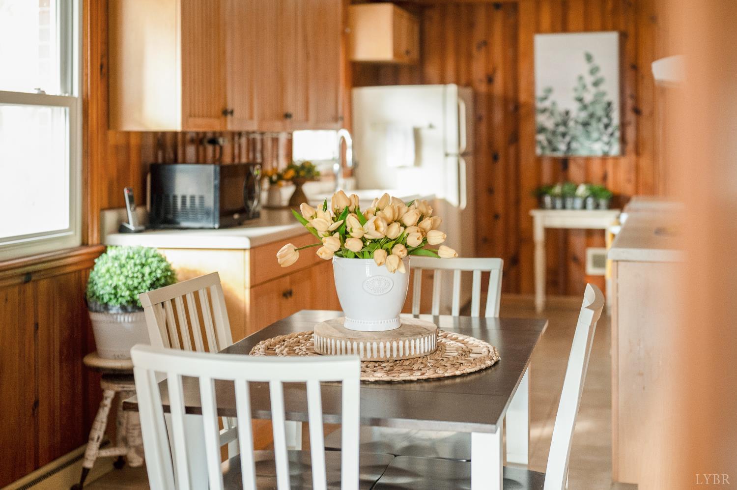 41 Piedmont Road Rustburg, VA 24588 - Photo 26 of 51 a view of a dining room with furniture a potted plant and a large window