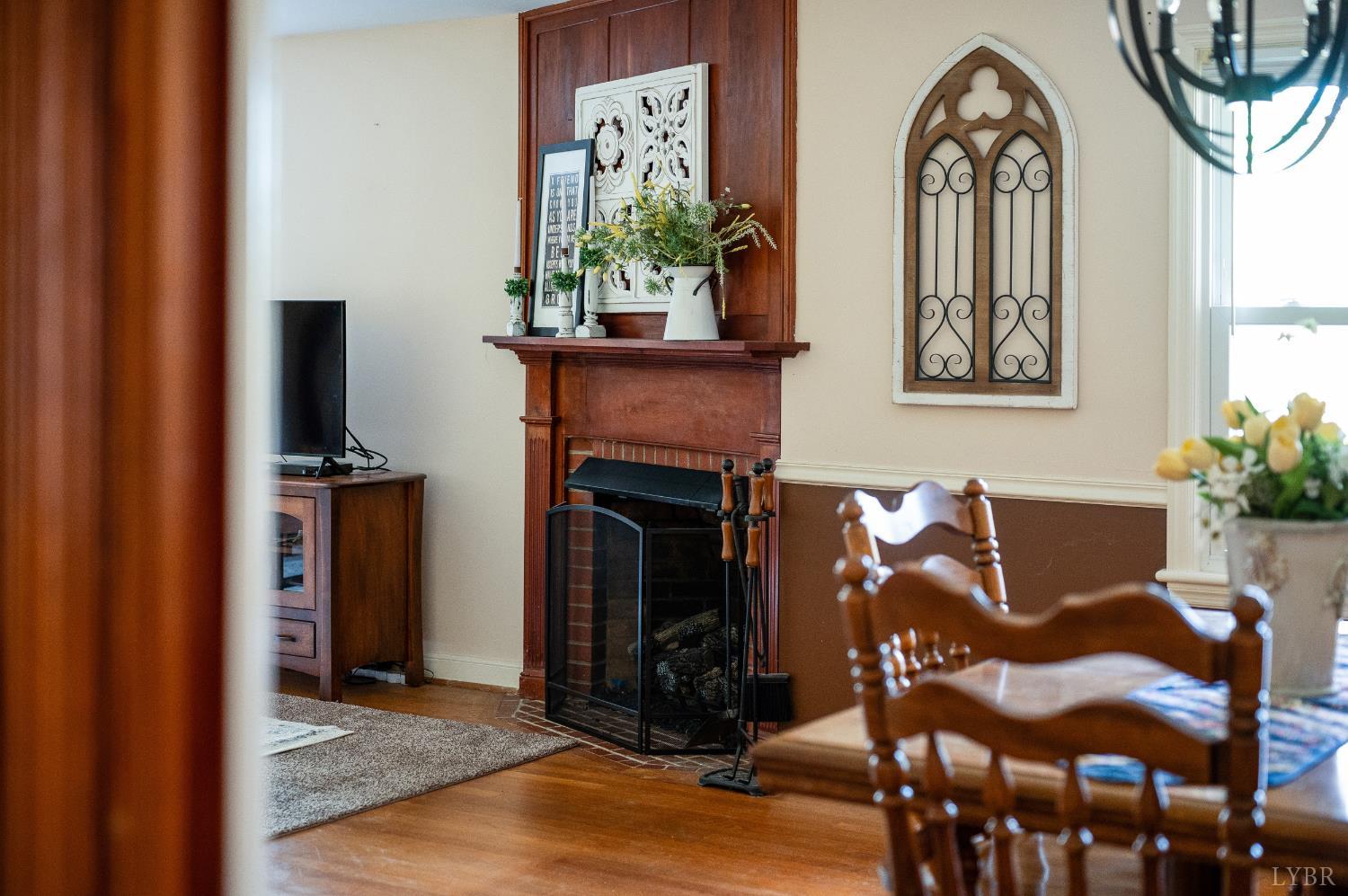 41 Piedmont Road Rustburg, VA 24588 - Photo 32 of 51 a view of a livingroom with furniture and a fireplace