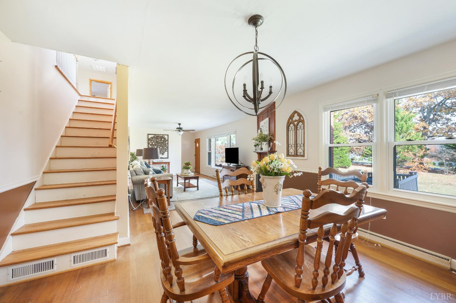 41 Piedmont Road Rustburg, VA 24588 - Photo 33 of 51 a view of a dining room with furniture window and wooden floor