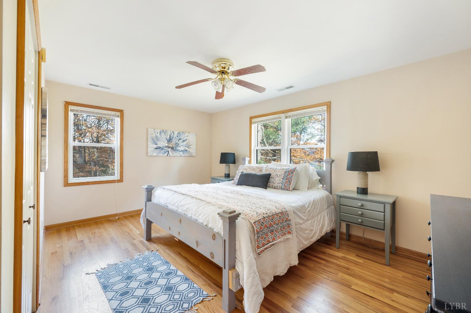 41 Piedmont Road Rustburg, VA 24588 - Photo 36 of 51 a bedroom with a bed and wooden floor
