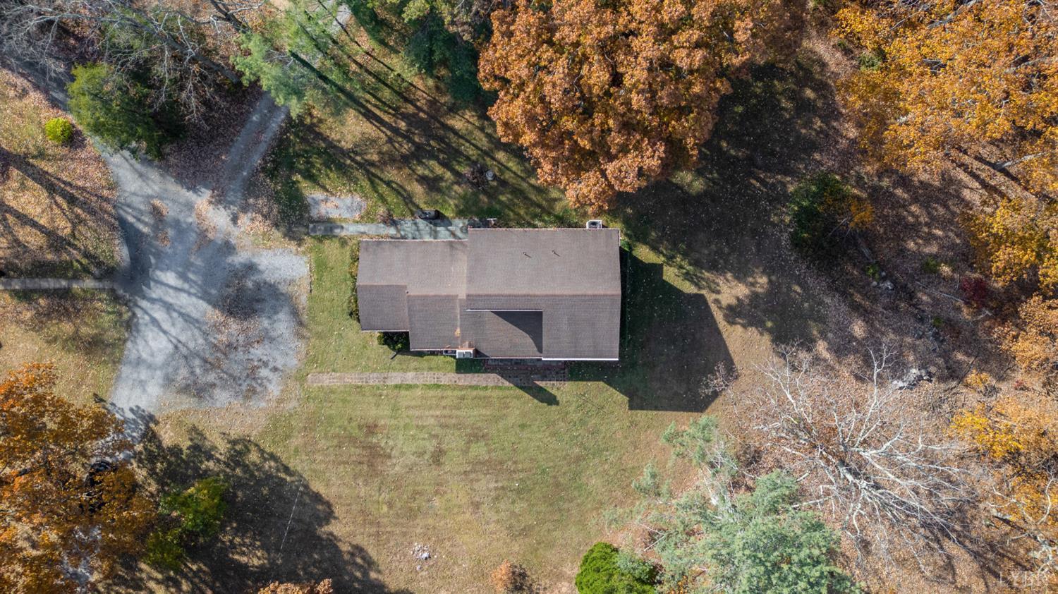 41 Piedmont Road Rustburg, VA 24588 - Photo 49 of 51 a house that has a tree in front of it