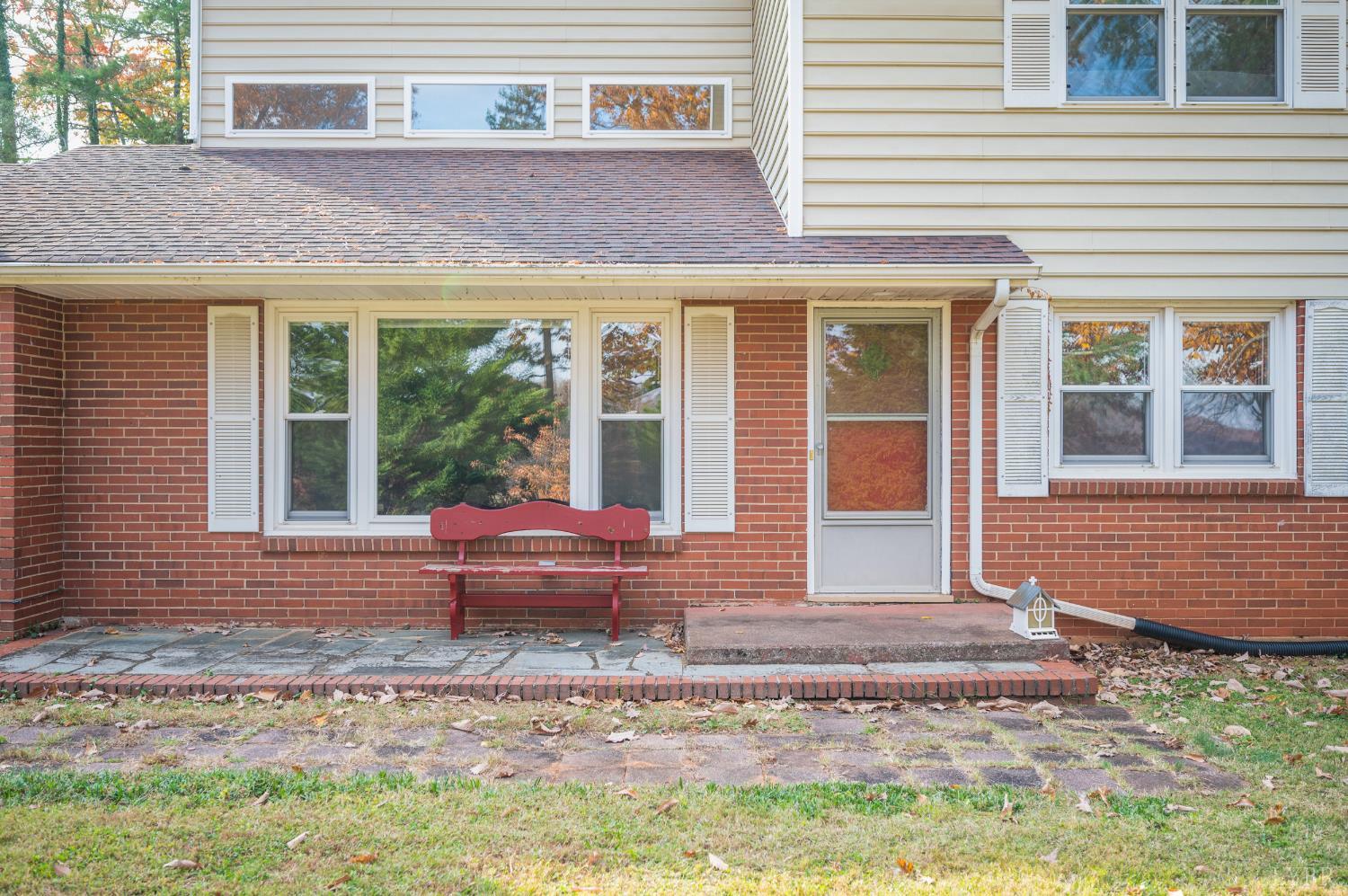 41 Piedmont Road Rustburg, VA 24588 - Photo 7 of 51 a front view of a house with a yard