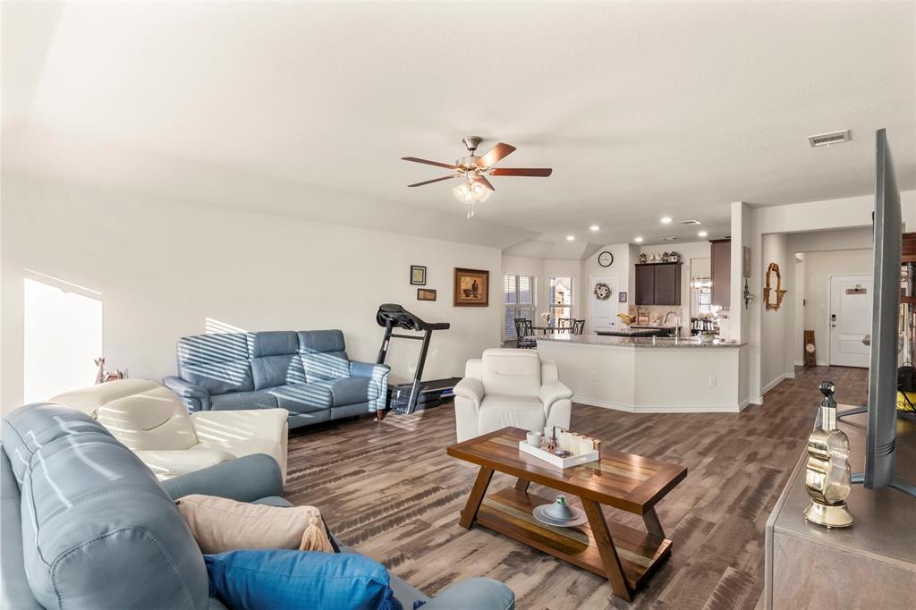 217 Watson Street Red Oak, TX 75154 - Photo 11 of 40 a living room with furniture and kitchen view