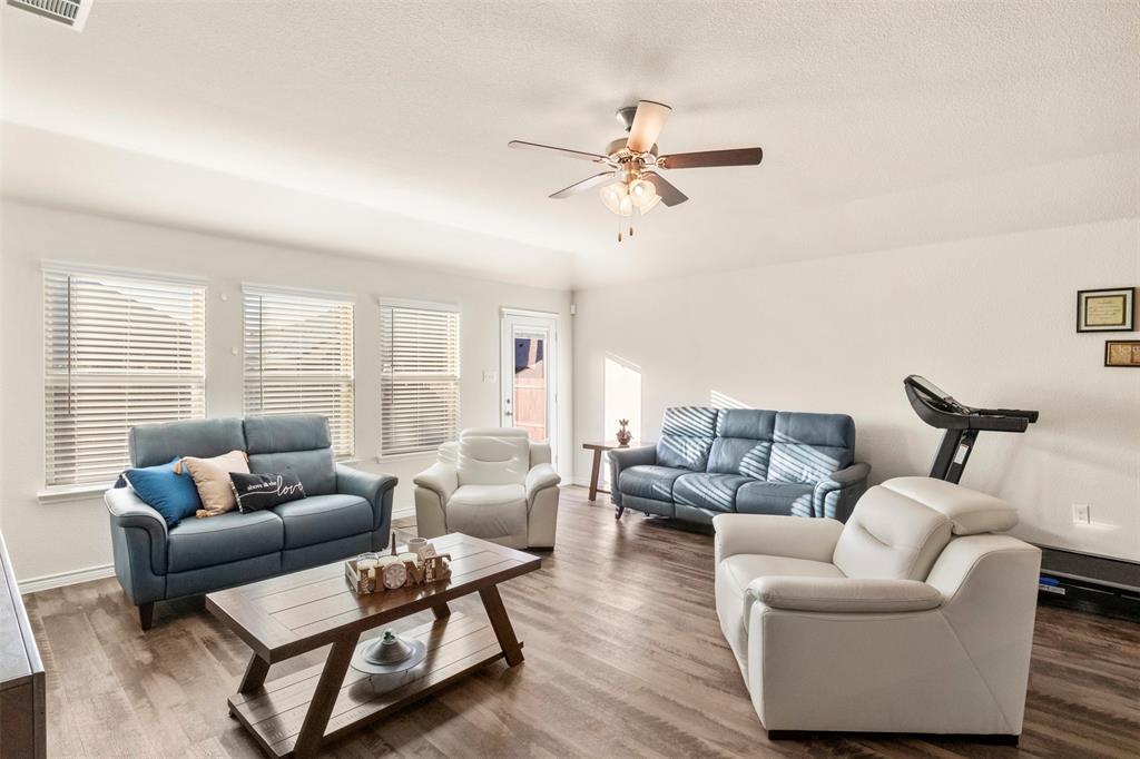 217 Watson Street Red Oak, TX 75154 - Photo 12 of 40 a living room with furniture and a large window