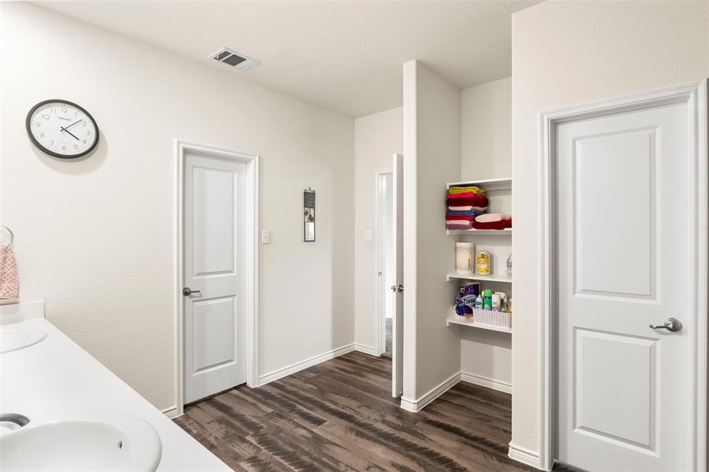 217 Watson Street Red Oak, TX 75154 - Photo 25 of 40 a view of room with wooden floor and window