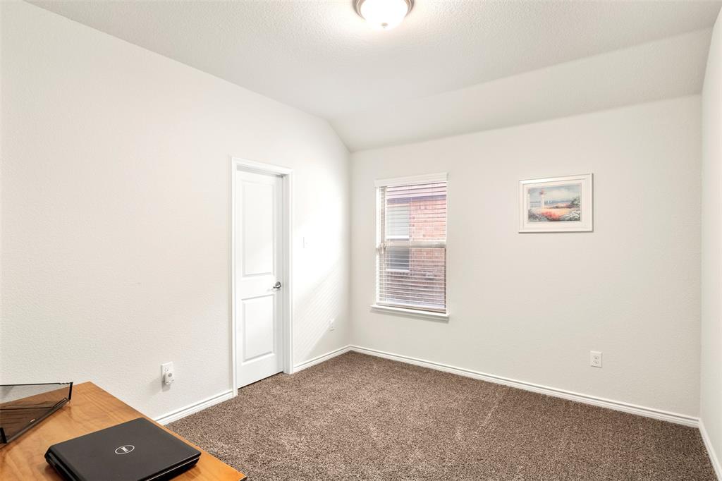 217 Watson Street Red Oak, TX 75154 - Photo 30 of 40 an empty room with windows and closet