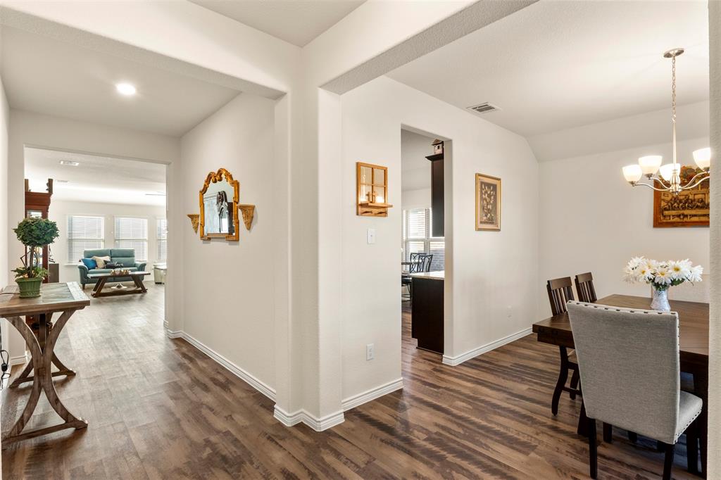 217 Watson Street Red Oak, TX 75154 - Photo 5 of 40 a view of a room with furniture and wooden floor