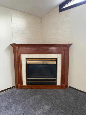 a living room with a fireplace