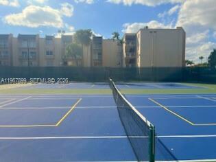 7705 Southwest 86th Street, Unit B213 Miami, FL 33143 - Photo 12 of 14 a view of a tennis court