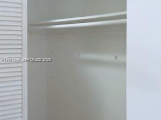 7705 Southwest 86th Street, Unit B213 Miami, FL 33143 - Photo 10 of 14 a close view of closet