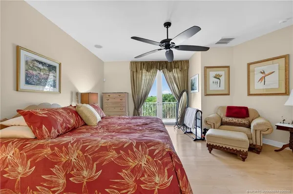 a view of a backyard with large trees