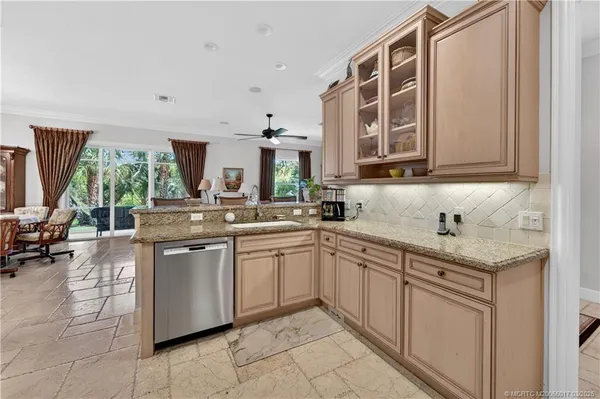 a bedroom with a bed window and couch