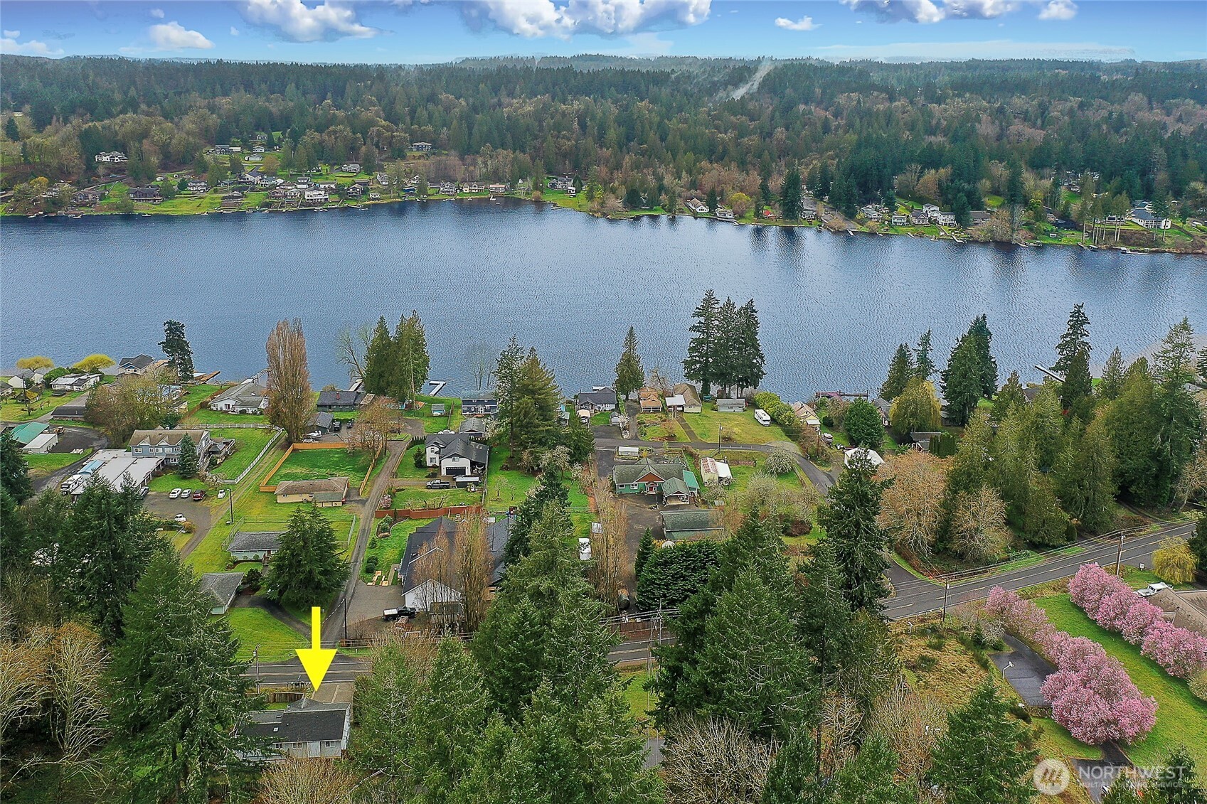 7239 Long Lake Road Southeast Port Orchard, WA 98367 - Photo 22 of 22 a view of a lake with a house