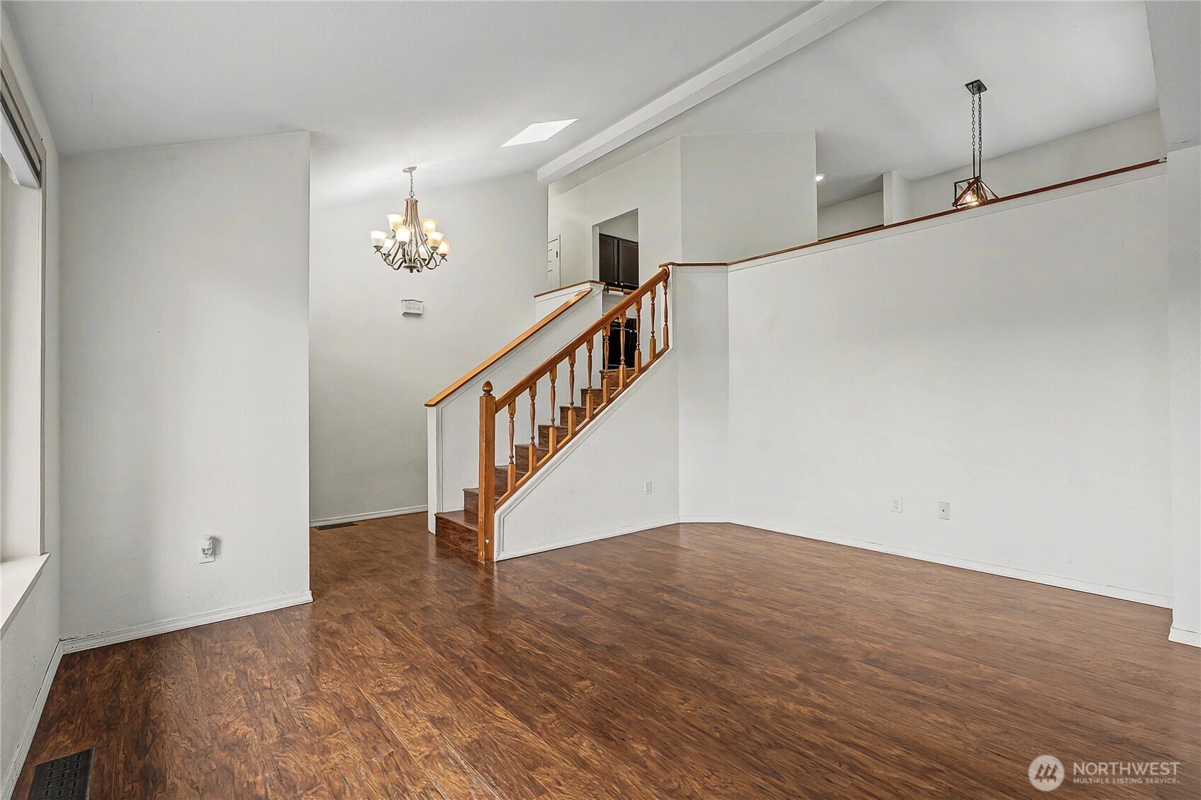 7239 Long Lake Road Southeast Port Orchard, WA 98367 - Photo 4 of 22 a view of an entryway with wooden floor