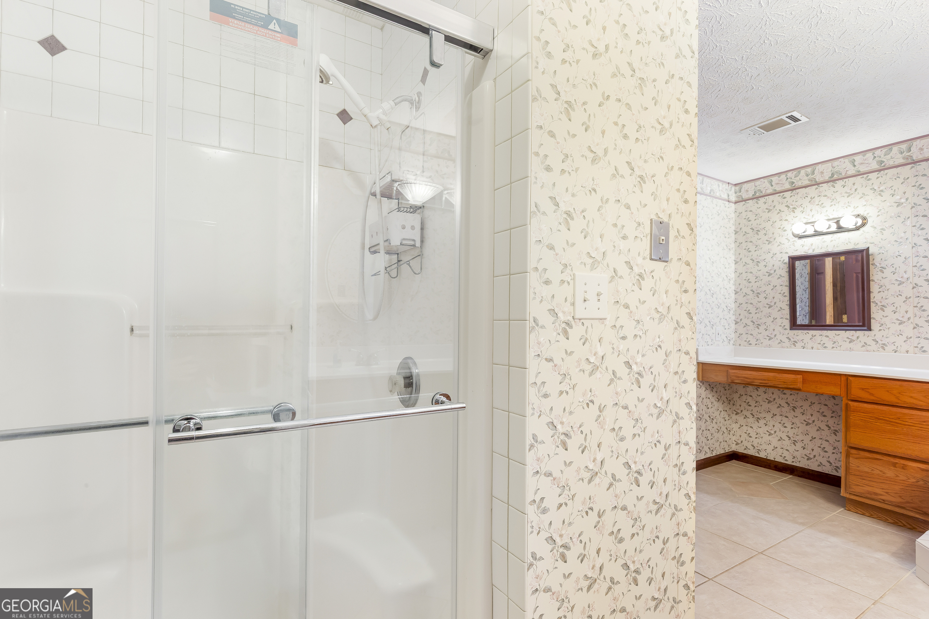 269 High Point Road Buchanan, GA 30113 - Photo 25 of 41 a bathroom with a shower and a sink