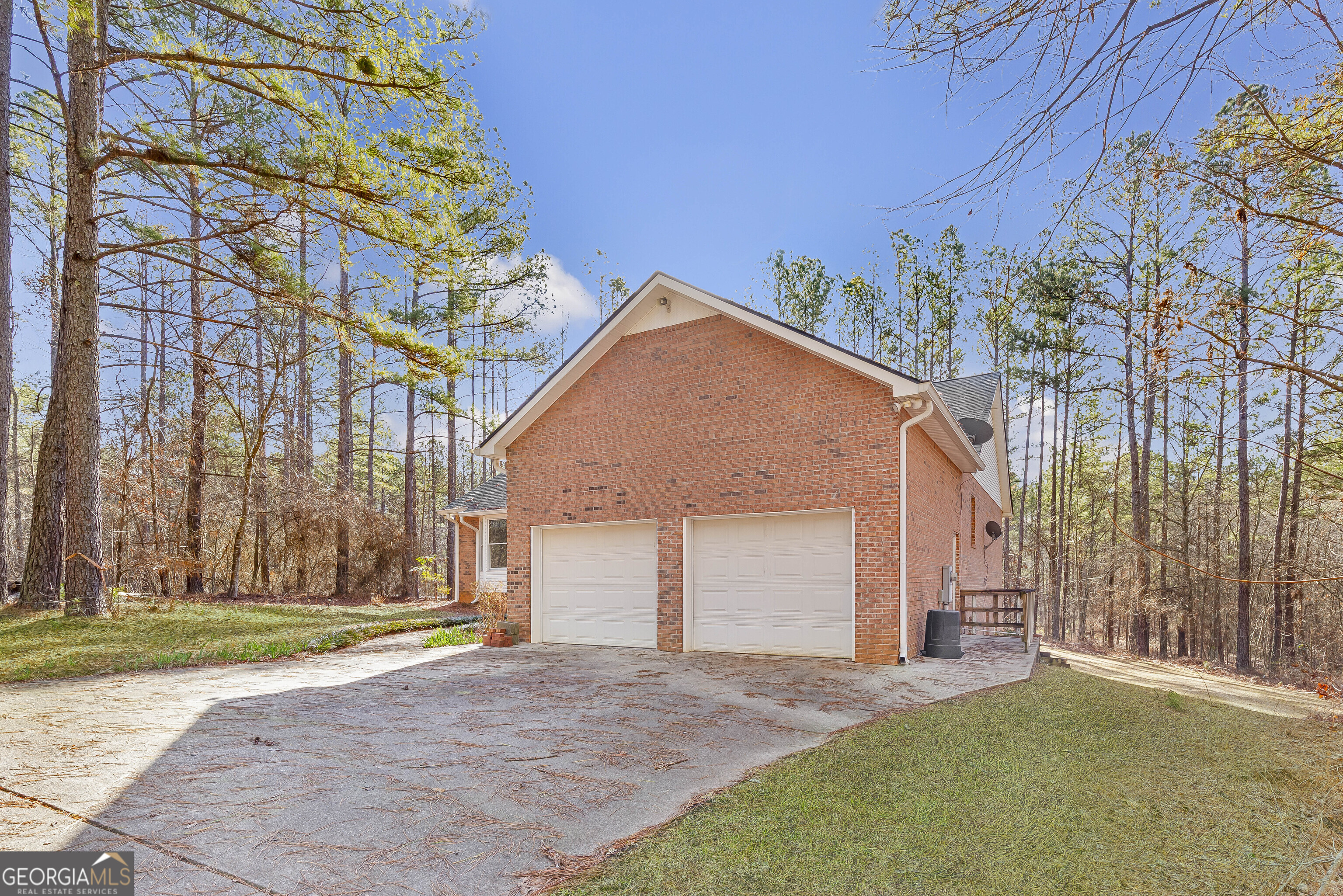 269 High Point Road Buchanan, GA 30113 - Photo 3 of 41 a view of a house with a yard and garage