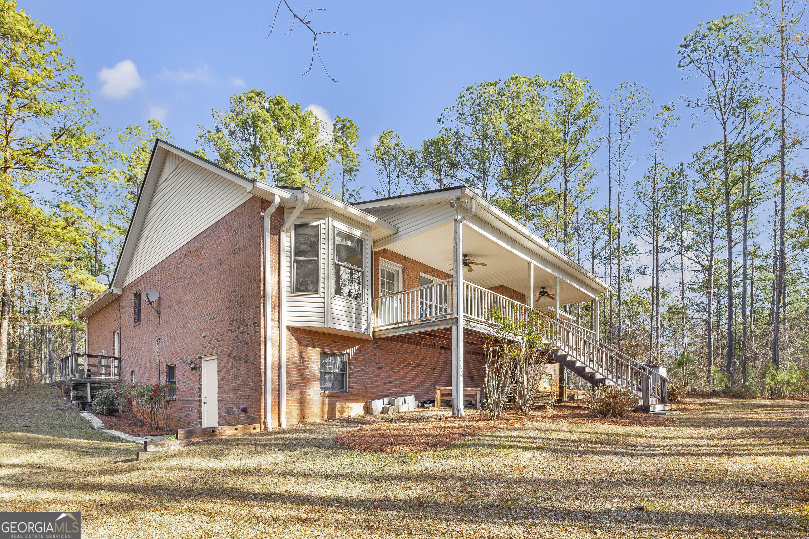 269 High Point Road Buchanan, GA 30113 - Photo 32 of 41 a view of a house with a yard and balcony