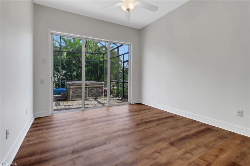 15480 River By Road Fort Myers, FL 33908 - Photo 28 of 48 Unfurnished room with ceiling fan and dark hardwood / wood-style floors