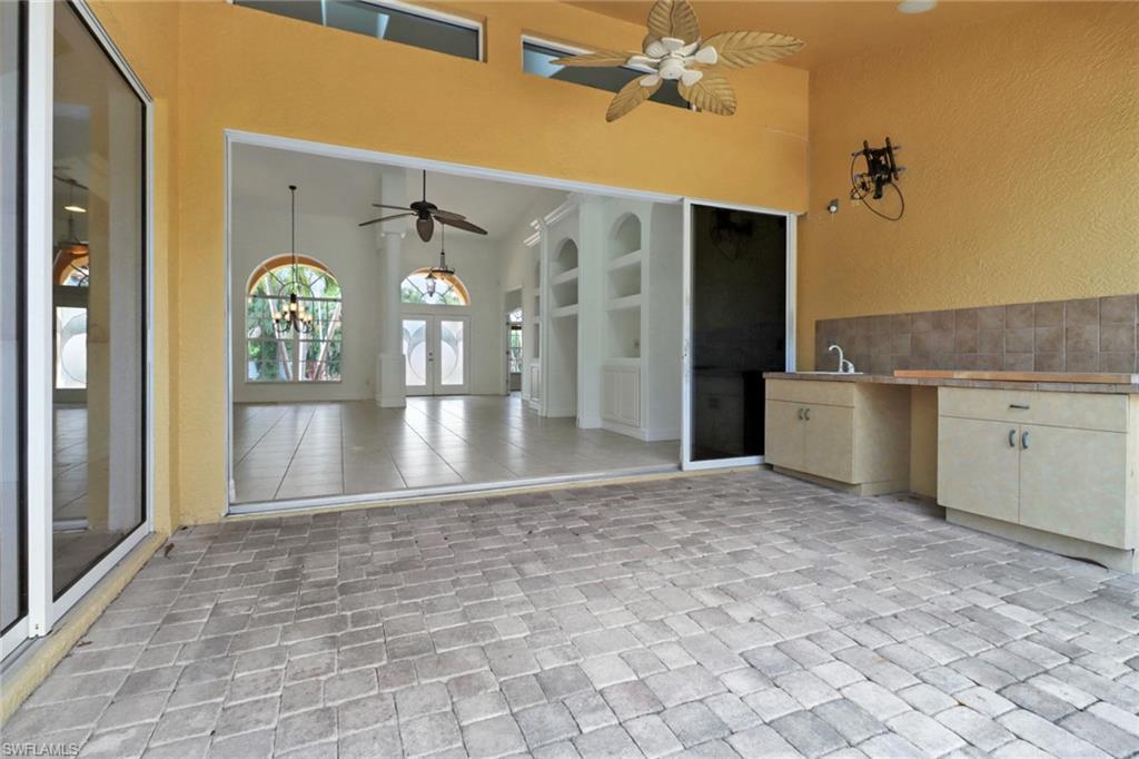 15480 River By Road Fort Myers, FL 33908 - Photo 31 of 48 View of patio / terrace with ceiling fan and french doors