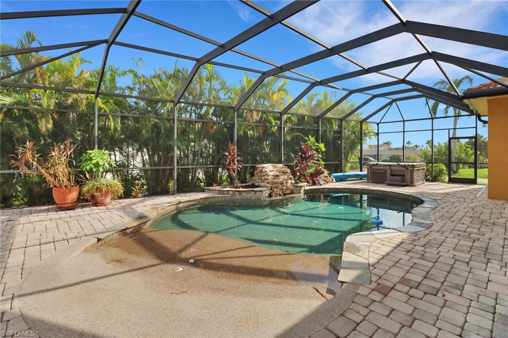 15480 River By Road Fort Myers, FL 33908 - Photo 32 of 48 View of pool with a patio, a jacuzzi, and a lanai