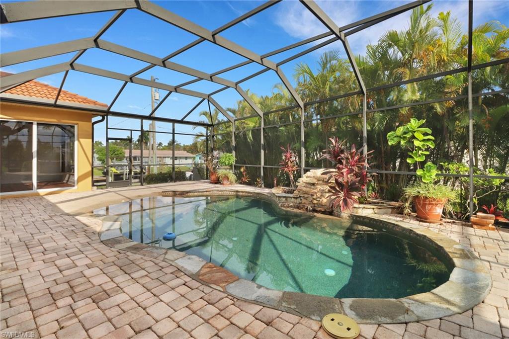 15480 River By Road Fort Myers, FL 33908 - Photo 34 of 48 View of swimming pool with a patio area and a lanai
