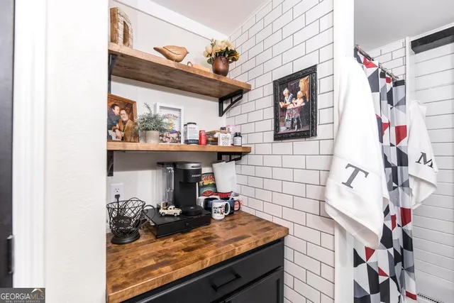 a view of balcony and trees