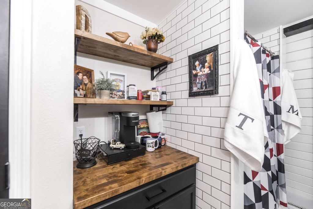 872 Henderson Road Dublin, GA 31021 - Photo 17 of 41 a view of storage and utility room