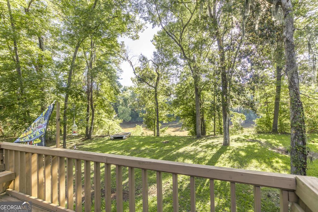 872 Henderson Road Dublin, GA 31021 - Photo 18 of 41 a view of balcony and trees