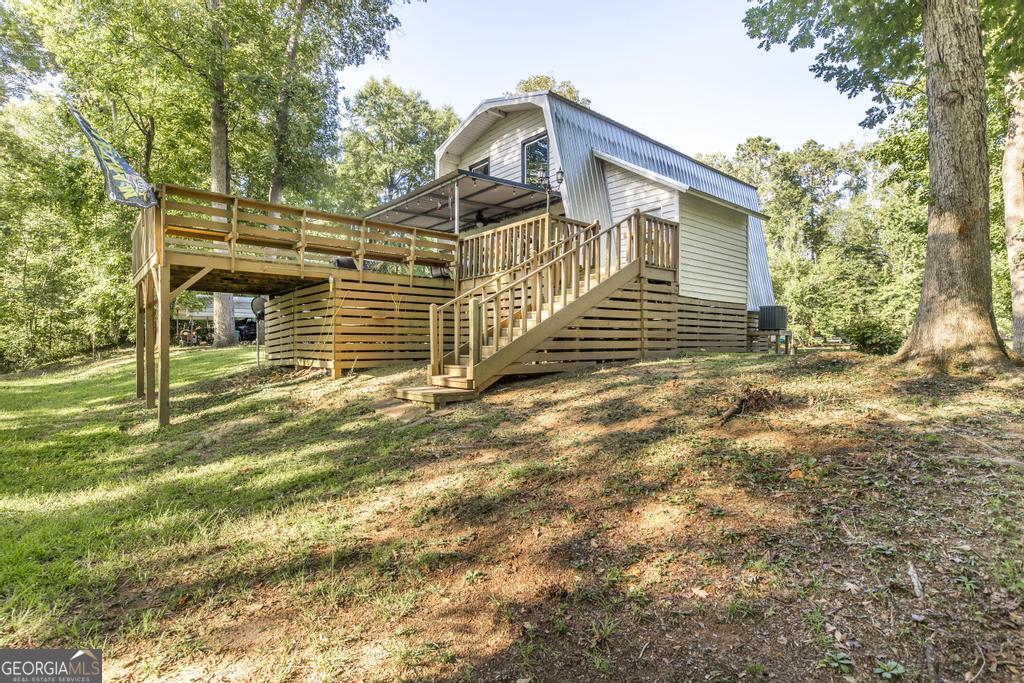 872 Henderson Road Dublin, GA 31021 - Photo 20 of 41 a view of a house with a yard
