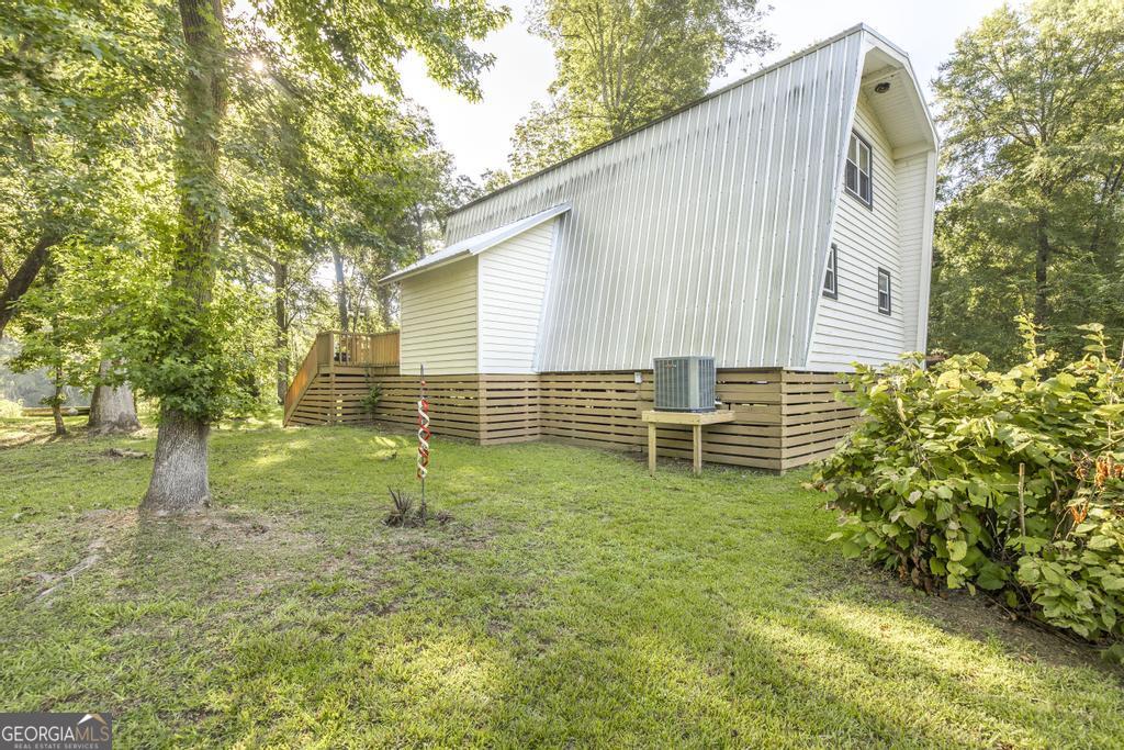 872 Henderson Road Dublin, GA 31021 - Photo 22 of 41 a backyard of a house