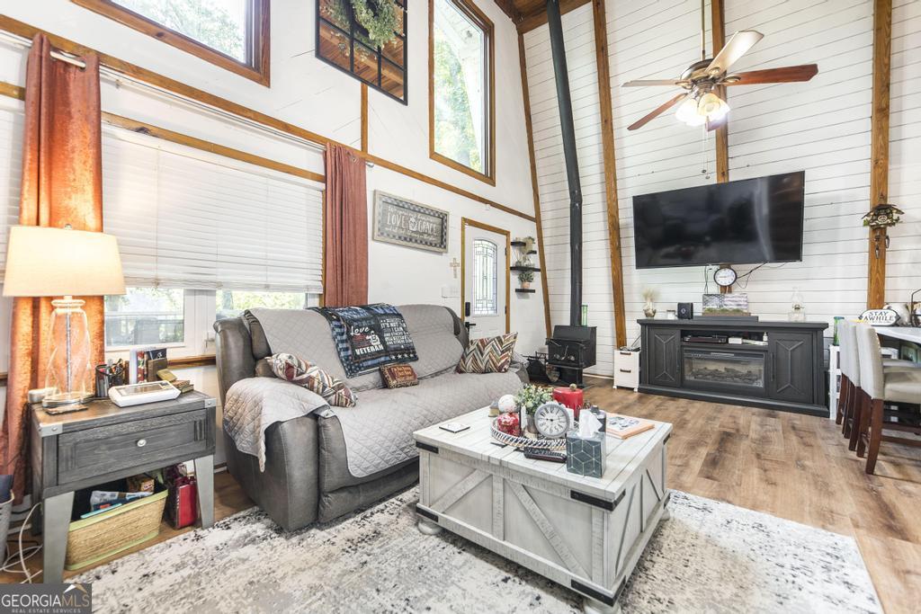 872 Henderson Road Dublin, GA 31021 - Photo 35 of 41 a living room with furniture and a flat screen tv