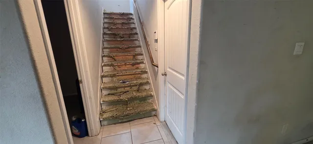 a view of entryway with stairs