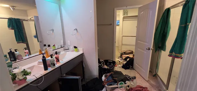 a view of a hallway with a workspace