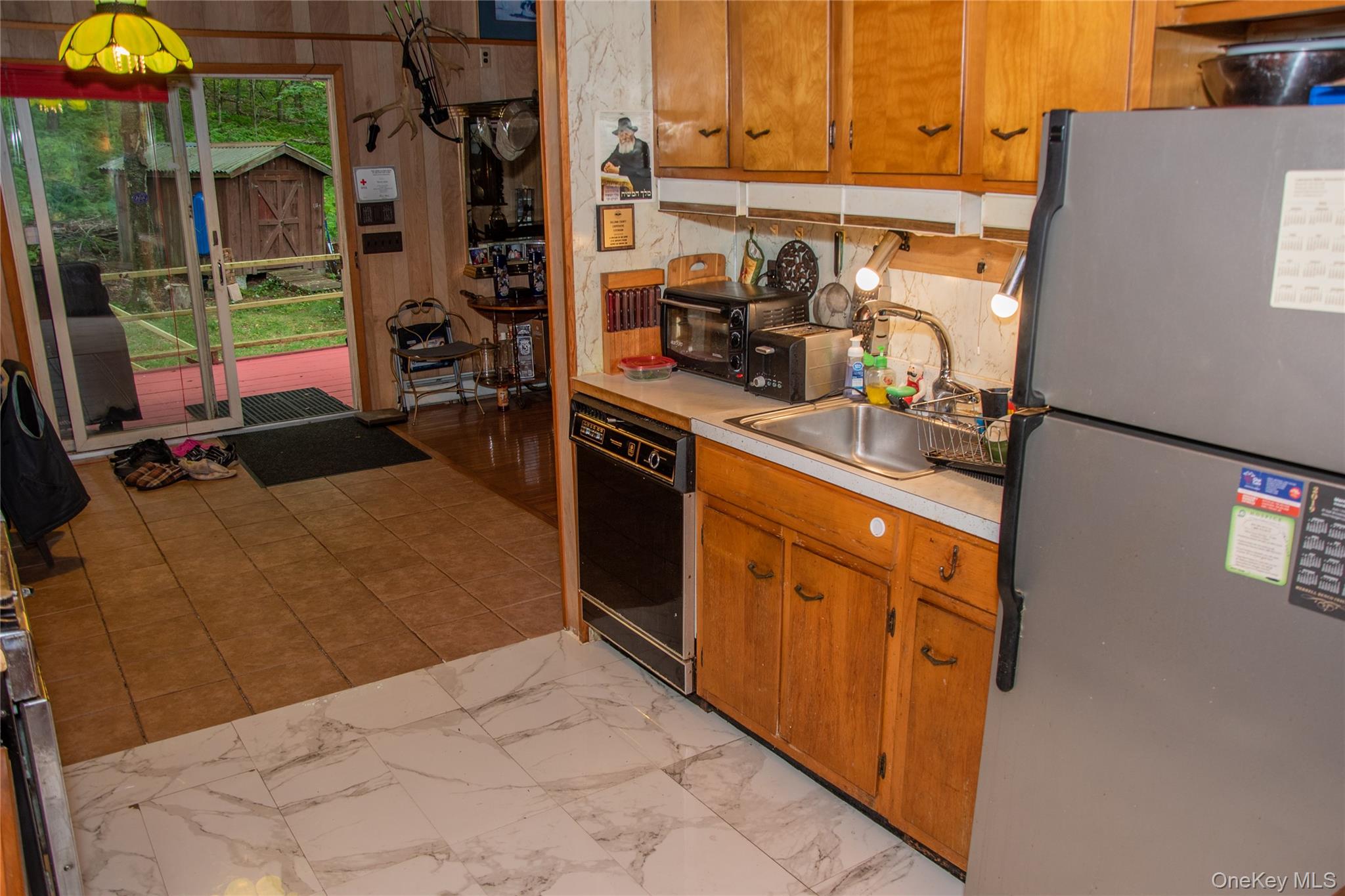 177 Davos Road Woodridge, NY 12789 - Photo 8 of 11 a kitchen with stainless steel appliances kitchen island granite countertop a sink and cabinets