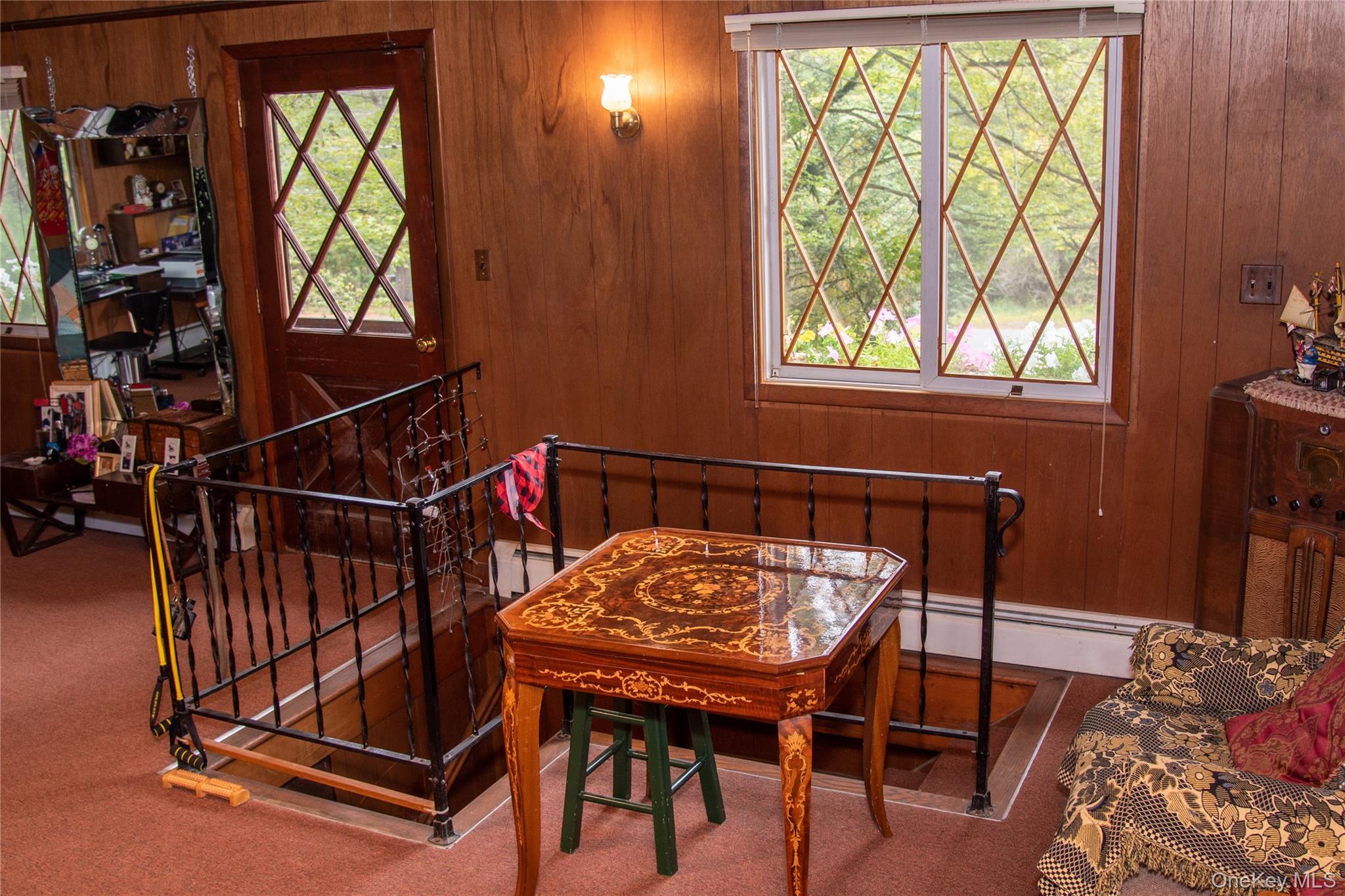 177 Davos Road Woodridge, NY 12789 - Photo 10 of 11 a view of a dining room with furniture and a window