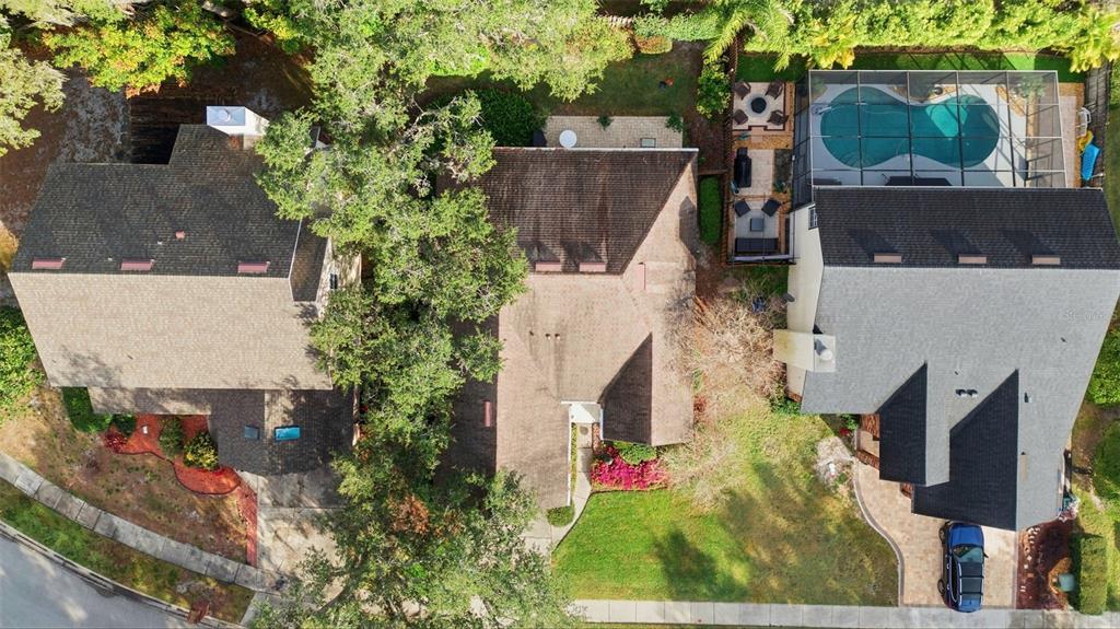 5452 Endicott Place Oviedo, FL 32765 - Photo 27 of 38 an aerial view of a house with garden space and street view