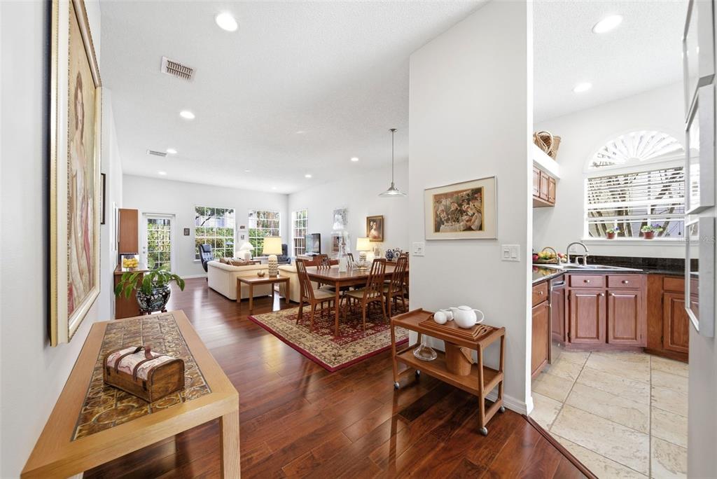 5452 Endicott Place Oviedo, FL 32765 - Photo 5 of 38 a living room with furniture window and wooden floor