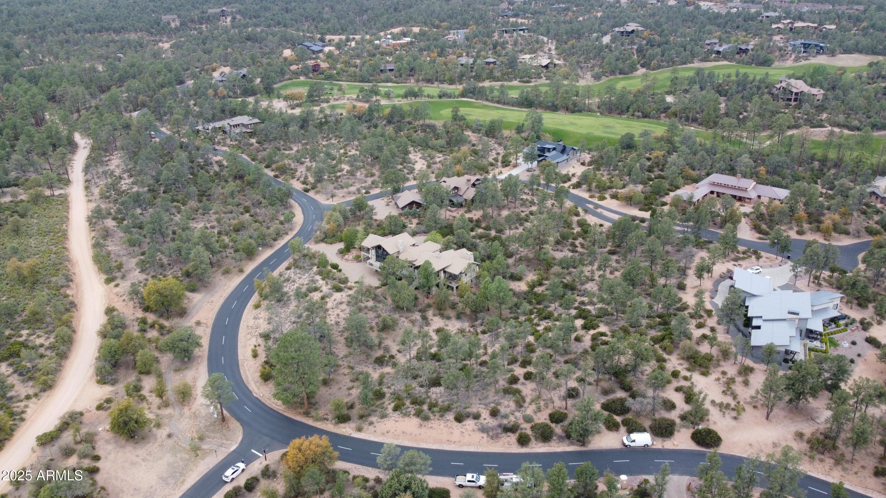 2400 South Rim Club Drive, Unit 105 Payson, AZ 85541 - Photo 10 of 12 a view of a houses with a yard